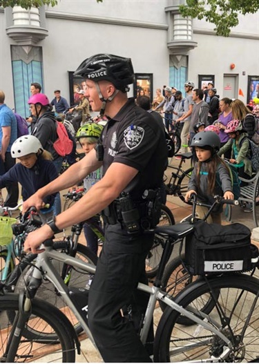 A special enforcement team member riding along at Ciclavia.